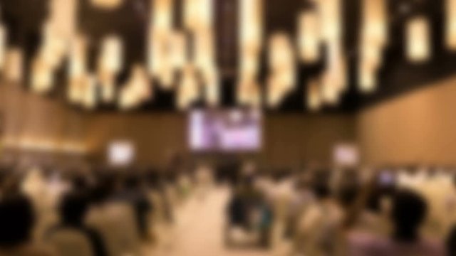 people in modern conference hall interior.  Audience in seminar room. Attendee, business event timelapse concept. 