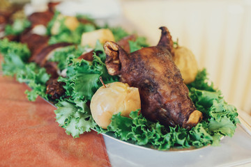 Baked pig with apples