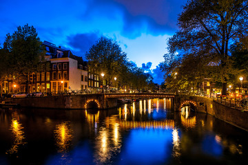 Night shot of Amsterdam canals city view, Netherlands