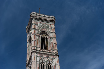 Eighty-five meter high tower Giotto's Campanile (designed in 1334 by Giotto di Bondone) - bell tower of the Basilica di Santa Maria del Fiore. Florence, Italy.