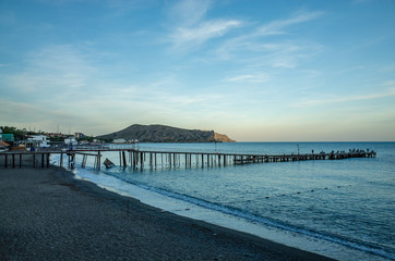Sea shore in the evening, Sudak, Crimea
