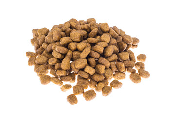 Pile of granulated animal feeds on white background