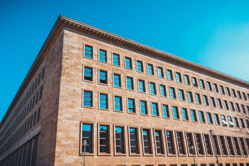 Fototapeta premium Long unadorned brown stone building