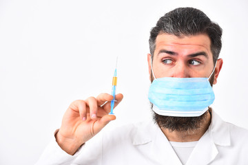 Doctor with surprised face wears medical face mask