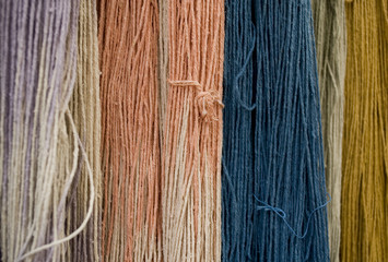 Background: flax fiber hank (birch), of blue, yellow, pink color, obtained with a natural dye and...