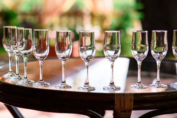 Arrangement of glasses for wine.