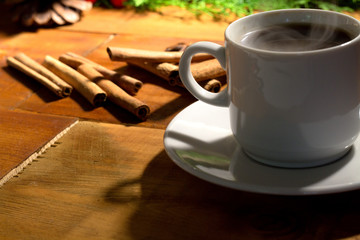 Coffee cup on wood table with space.