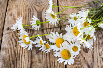 Summer wildflowers on wooden table