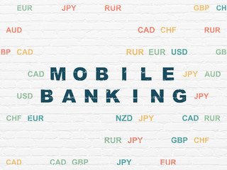 Money concept: Mobile Banking on wall background