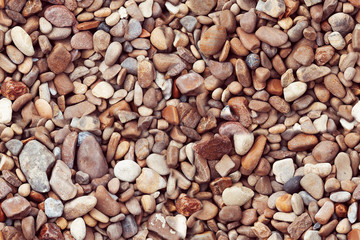 Sea pebbles. Small stones gravel texture background.Pile of pebbles, thailand.Color stone in...