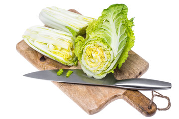 Cut cabbage of Chinese cabbage on kitchen wooden cutting board
