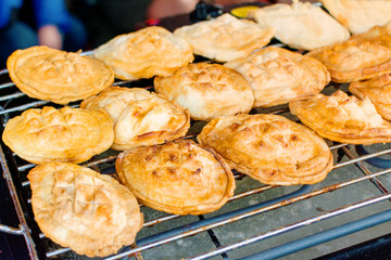 Traditional Polish smoked cheese made of sheep milk known as oscypek on barbecue. 