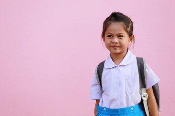 Asian girls in school uniform are smiling happily.
