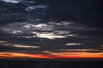 Fototapeta na wymiar Beautiful red sunrise in the northern summer sea