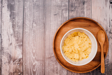 white bowl of corn flakes