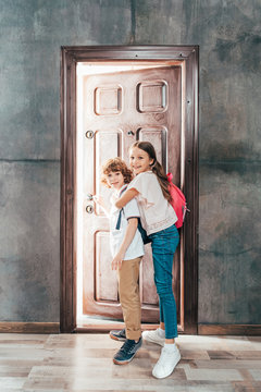 Adorable Kids Walking Through Door, Going To School