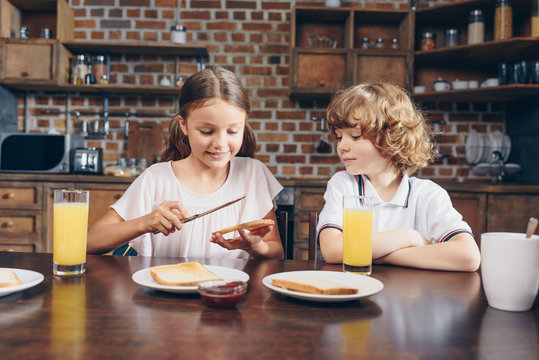 Adorable Little Kids Having Breakfast Before School