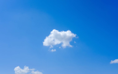 Naklejka na ściany i meble White cloud on the blue sky in the sunny day