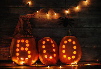 Halloween pumpkins on wooden background