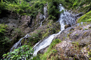 Krok-E-Dok waterfall and rain forest on mountain in Khao Yai National park, Thailand.
