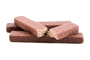 chocolate waffles isolated on white background.Cracked chocolate waffles isolated