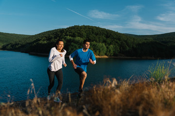 Running partners having fun competing in a little race