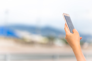 Beautiful woman is using smart phones