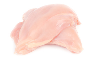 Pile of raw chicken fillet breast isolated
