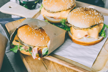 a hamburger Baked bread with vegetables, cream and pork, fast food, popular fast food.