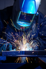 Welder erecting technical steel