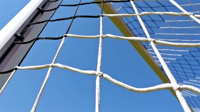 Detail shot of soccer football door net, low angle