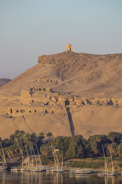 Egypt, Upper Egypt, Aswan, Elephantine Island, View of river Nile and Tombs of the Nobles on the West Bank