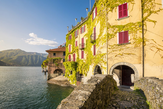 Nesso, lake Como, Como province, Italy. Lake shore from the roman stone bridge.