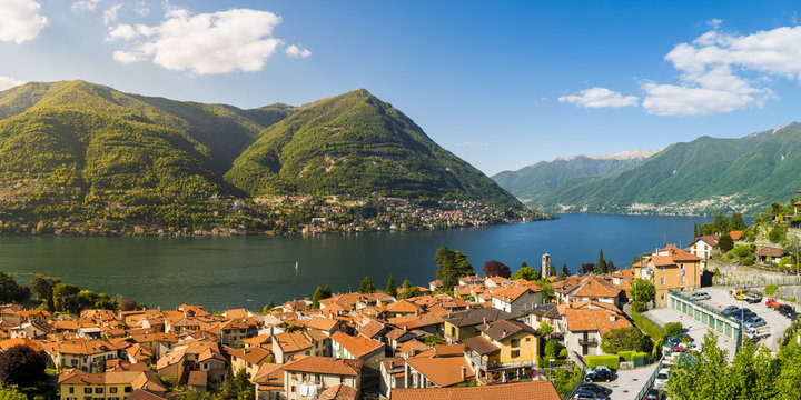 Torno, lake Como, Como province, Lombardy, Italy. Panoramic high angle view of the town and the lake.