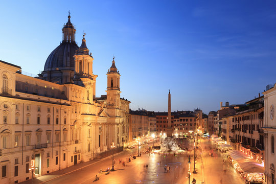 Italy, Rome, Navona square with Sant'Agnese in Agone church and 4 rivers fountain (Fontana dei Quattro Fiumi) by night