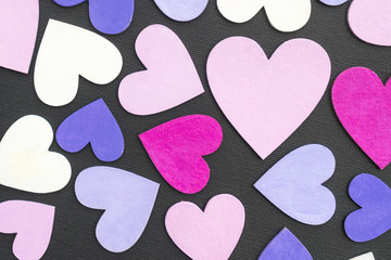 Colorful hearts on the dark background