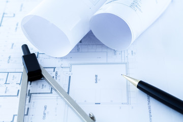Architect blueprint plans on worktable. Construction Plans for Building. Architect Design tools 