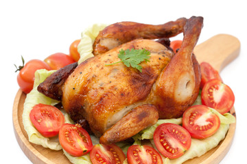 roast chicken on wooden plate  isolated on white