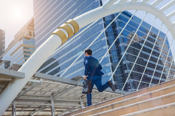 Business man run to work in rush hour