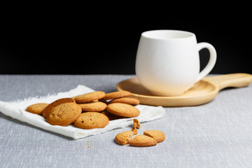 cookies and milk on gray cloth background