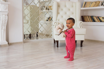 Cute curious baby in the room