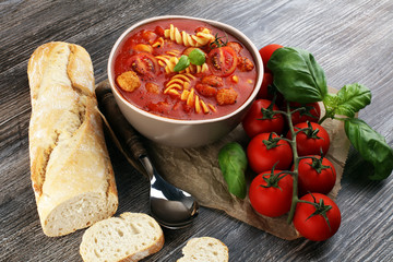 Tomato soup with meatballs in a bowl. Italian minestrone soup