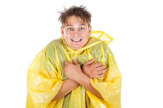 Young Man Wearing A Yellow Raincoat