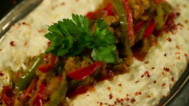 Turkish Hunkar Begendi Kebab revolving in slow motion