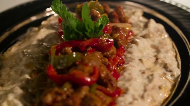 Turkish Hunkar Begendi Kebab revolving in slow motion