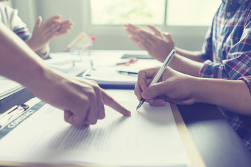 Businessperson Signing Contract about insurance, Businessmen writing with pen sign of modest...