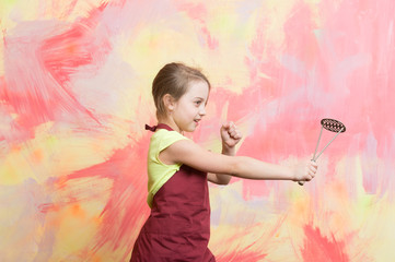 Fototapeta premium Small girl on colorful background.