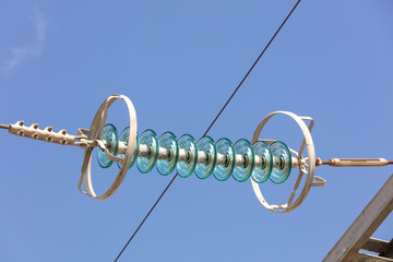 glass insulators in a high voltage wire