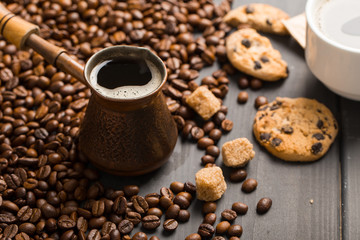 black coffee beans on black background
