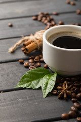 black coffee beans on black background